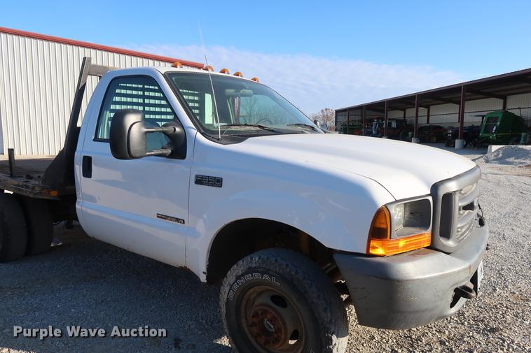 image for item DD9560 2000 Ford F350 Super Duty flatbed pickup truck