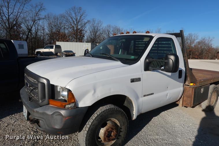 image for item DD9560 2000 Ford F350 Super Duty flatbed pickup truck