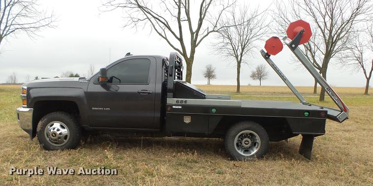 image for item DS9631 2015 Chevrolet Silverado 3500HD flatbed pickup truck