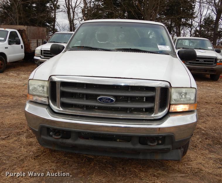 image for item J5566 2004 Ford F250 Super Duty XLT SuperCab utility bed pickup truck
