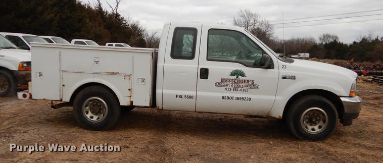 image for item J5566 2004 Ford F250 Super Duty XLT SuperCab utility bed pickup truck