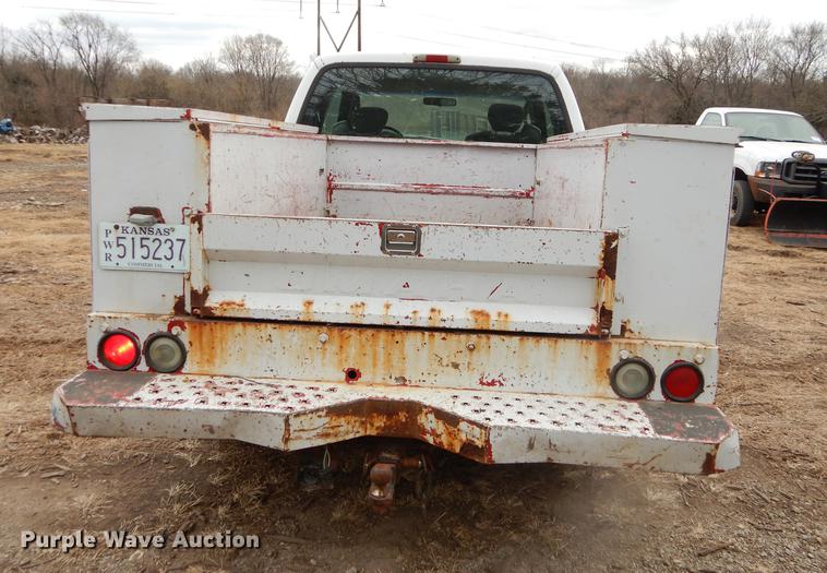 image for item J5566 2004 Ford F250 Super Duty XLT SuperCab utility bed pickup truck