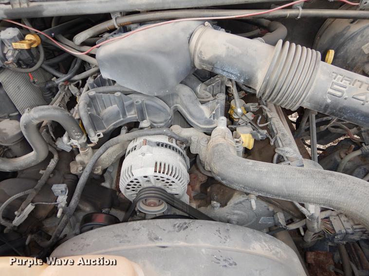 image for item J5566 2004 Ford F250 Super Duty XLT SuperCab utility bed pickup truck