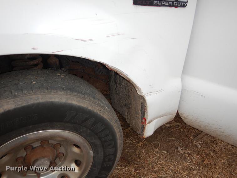 image for item J5566 2004 Ford F250 Super Duty XLT SuperCab utility bed pickup truck