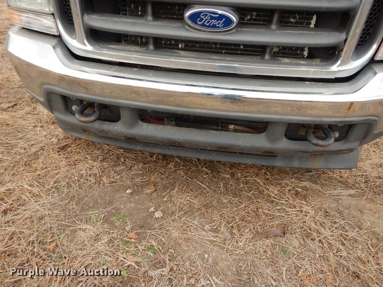 image for item J5566 2004 Ford F250 Super Duty XLT SuperCab utility bed pickup truck