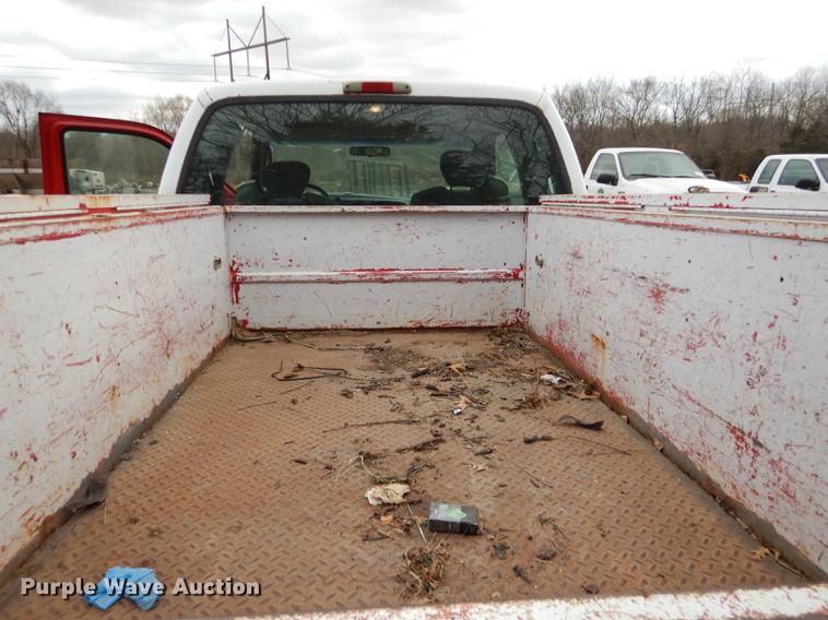 image for item J5566 2004 Ford F250 Super Duty XLT SuperCab utility bed pickup truck