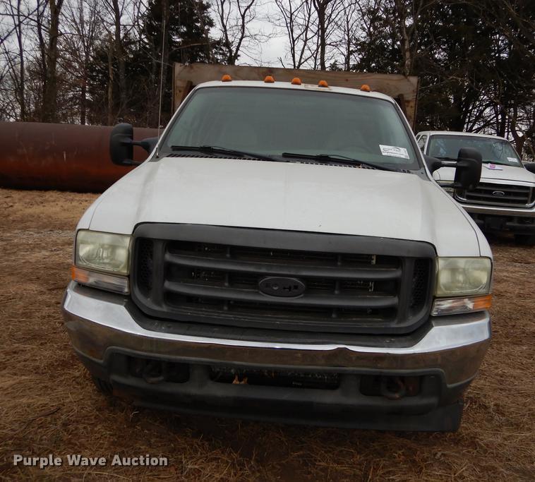 image for item J5627 2002 Ford F350 Super Duty XL flatbed pickup truck