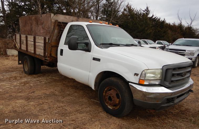 image for item J5627 2002 Ford F350 Super Duty XL flatbed pickup truck