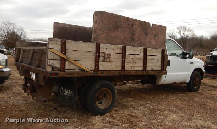 image for item J5627 2002 Ford F350 Super Duty XL flatbed pickup truck