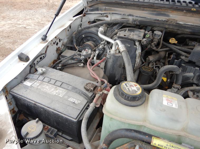 image for item J5627 2002 Ford F350 Super Duty XL flatbed pickup truck