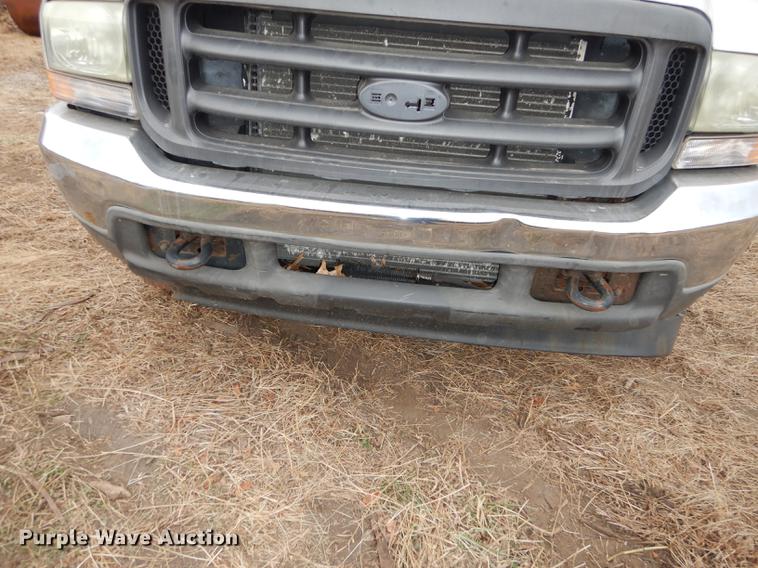 image for item J5627 2002 Ford F350 Super Duty XL flatbed pickup truck