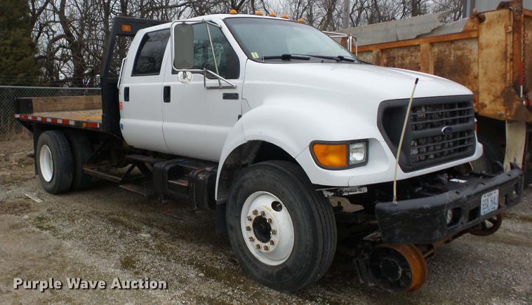 image for item K6291 2001 Ford F750 Crew Cab flatbed truck with DMF Rail Gear