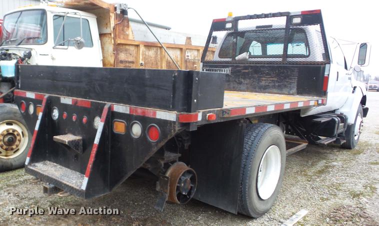 image for item K6291 2001 Ford F750 Crew Cab flatbed truck with DMF Rail Gear