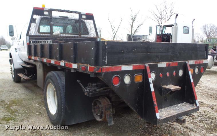 image for item K6291 2001 Ford F750 Crew Cab flatbed truck with DMF Rail Gear
