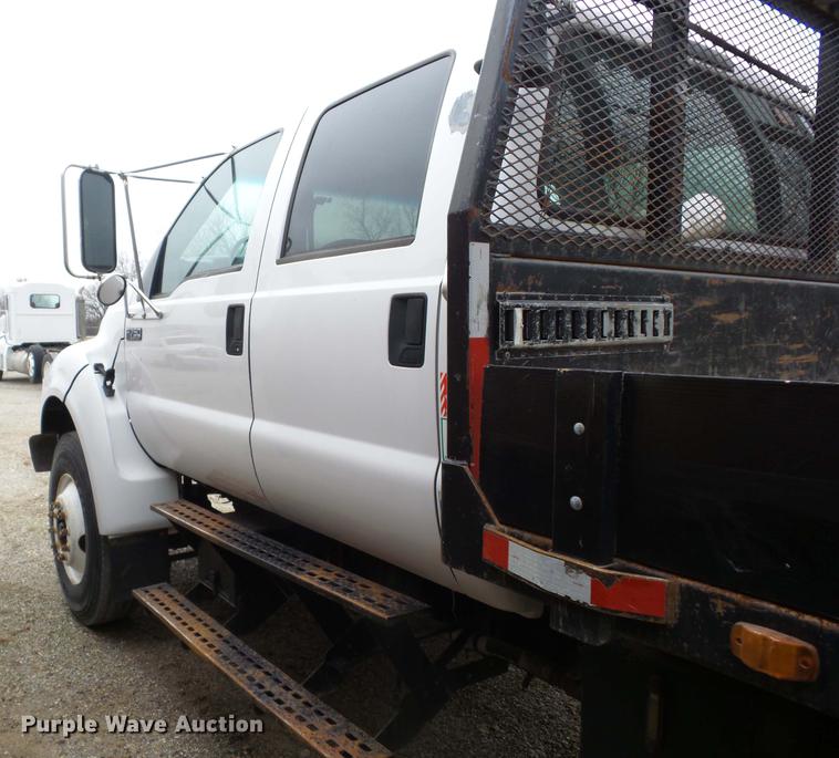 image for item K6291 2001 Ford F750 Crew Cab flatbed truck with DMF Rail Gear