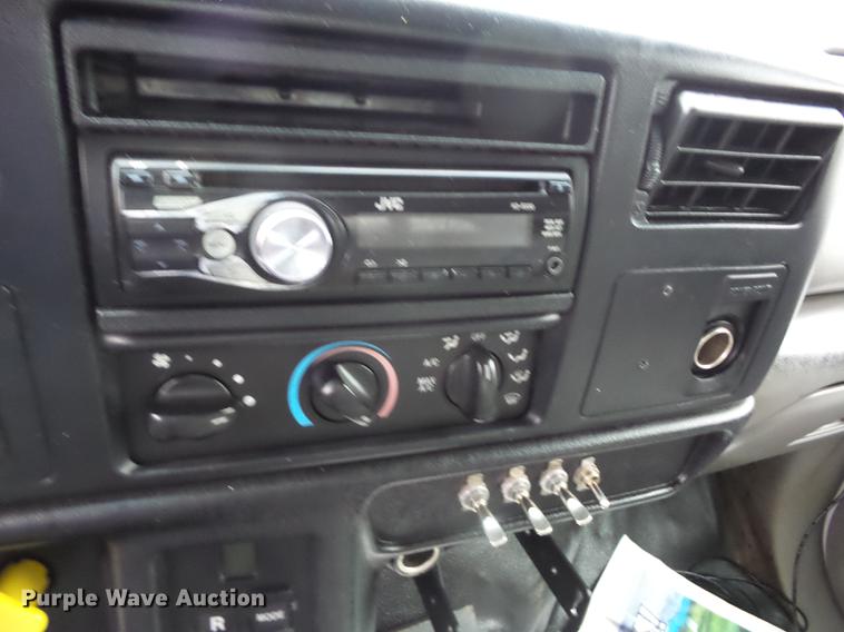 image for item K6291 2001 Ford F750 Crew Cab flatbed truck with DMF Rail Gear