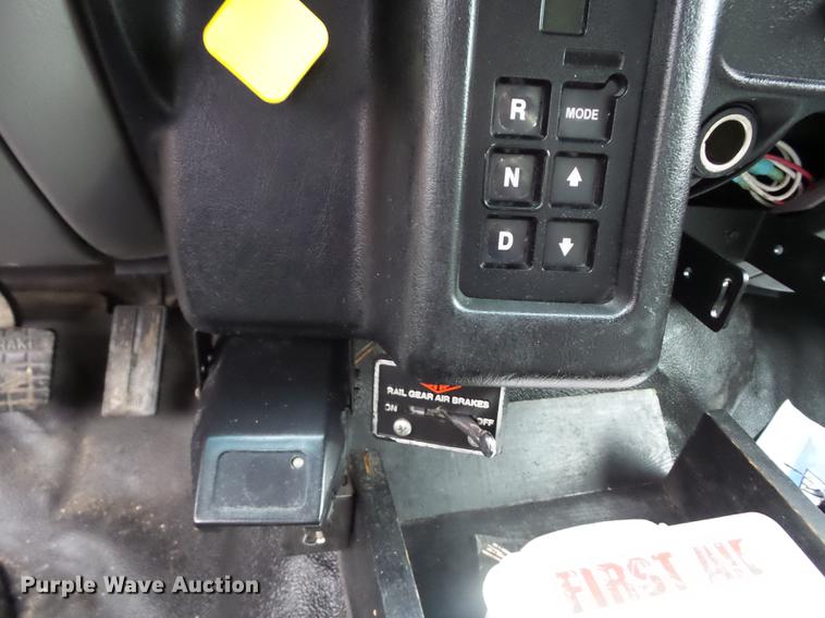 image for item K6291 2001 Ford F750 Crew Cab flatbed truck with DMF Rail Gear