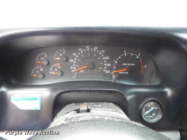 image for item K6291 2001 Ford F750 Crew Cab flatbed truck with DMF Rail Gear