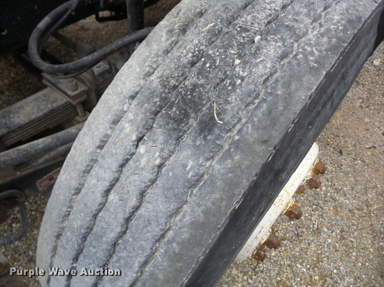 image for item K6291 2001 Ford F750 Crew Cab flatbed truck with DMF Rail Gear