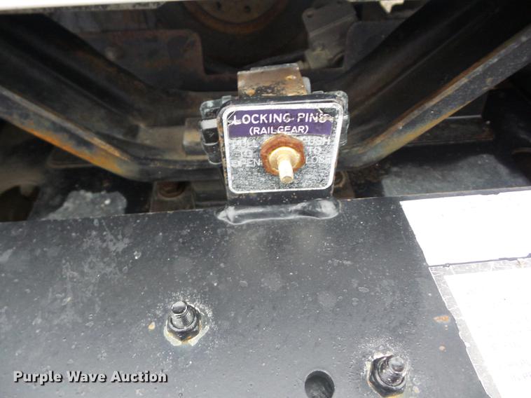 image for item K6291 2001 Ford F750 Crew Cab flatbed truck with DMF Rail Gear