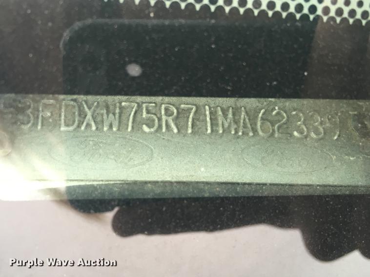 image for item K6291 2001 Ford F750 Crew Cab flatbed truck with DMF Rail Gear