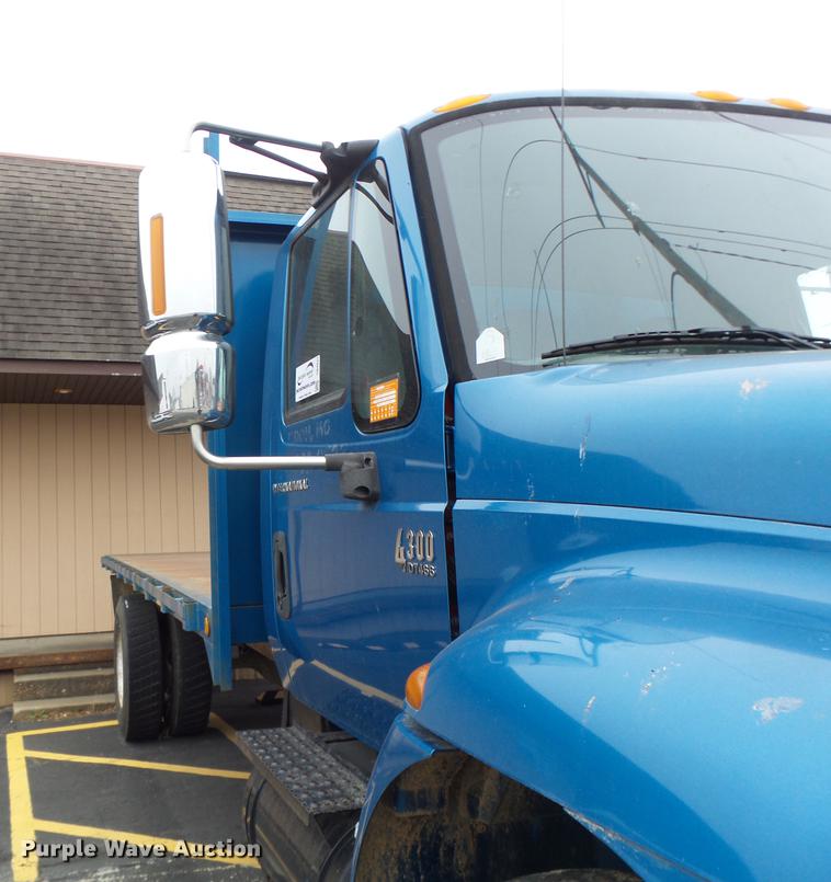 image for item DB9831 2002 International 4300 flat dump bed truck