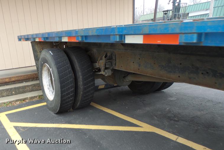 image for item DB9831 2002 International 4300 flat dump bed truck