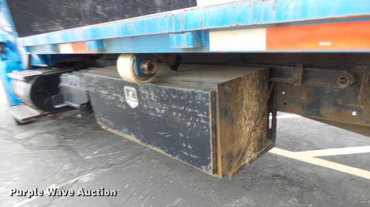 image for item DB9831 2002 International 4300 flat dump bed truck