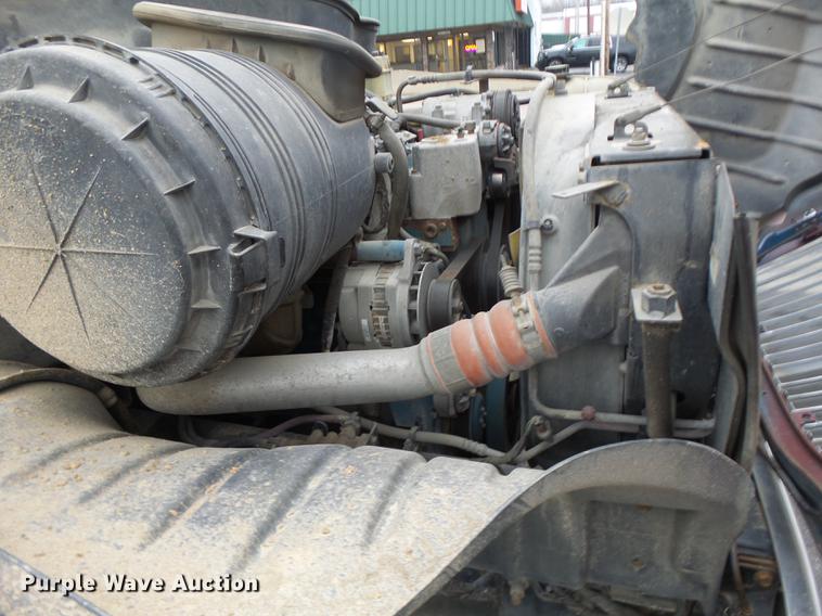 image for item DB9831 2002 International 4300 flat dump bed truck