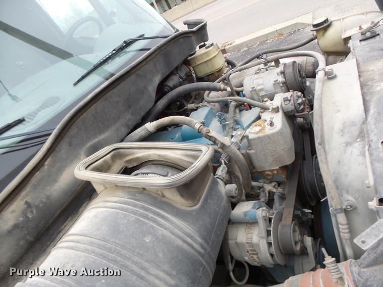 image for item DB9831 2002 International 4300 flat dump bed truck