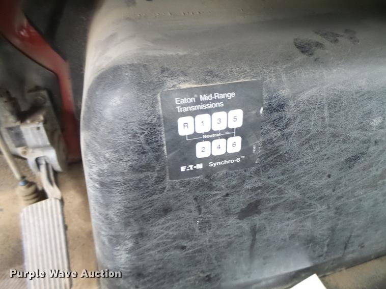 image for item DB9831 2002 International 4300 flat dump bed truck