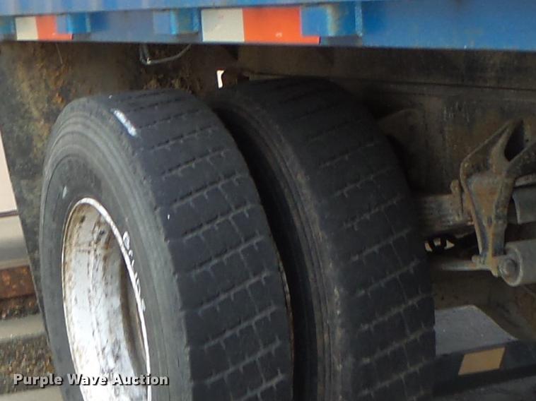 image for item DB9831 2002 International 4300 flat dump bed truck