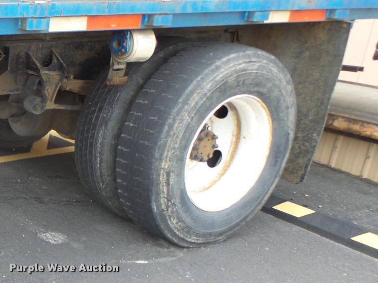 image for item DB9831 2002 International 4300 flat dump bed truck