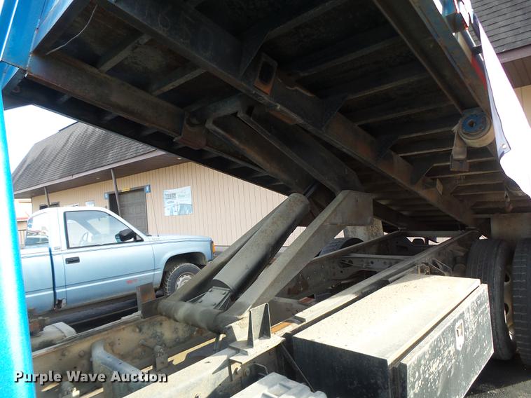 image for item DB9831 2002 International 4300 flat dump bed truck