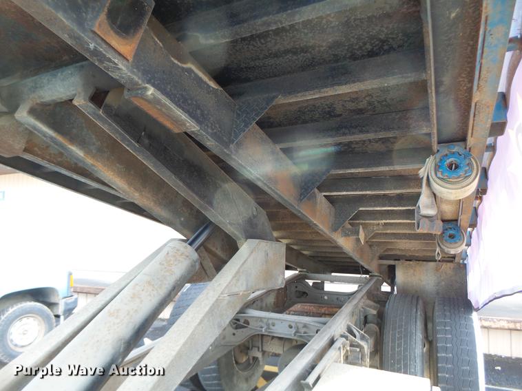 image for item DB9831 2002 International 4300 flat dump bed truck