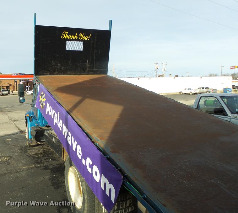 image for item DB9831 2002 International 4300 flat dump bed truck