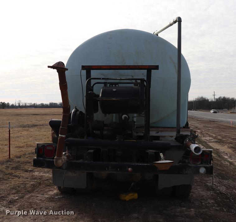 image for item EC9371 1995 Ford L9000 flatbed truck