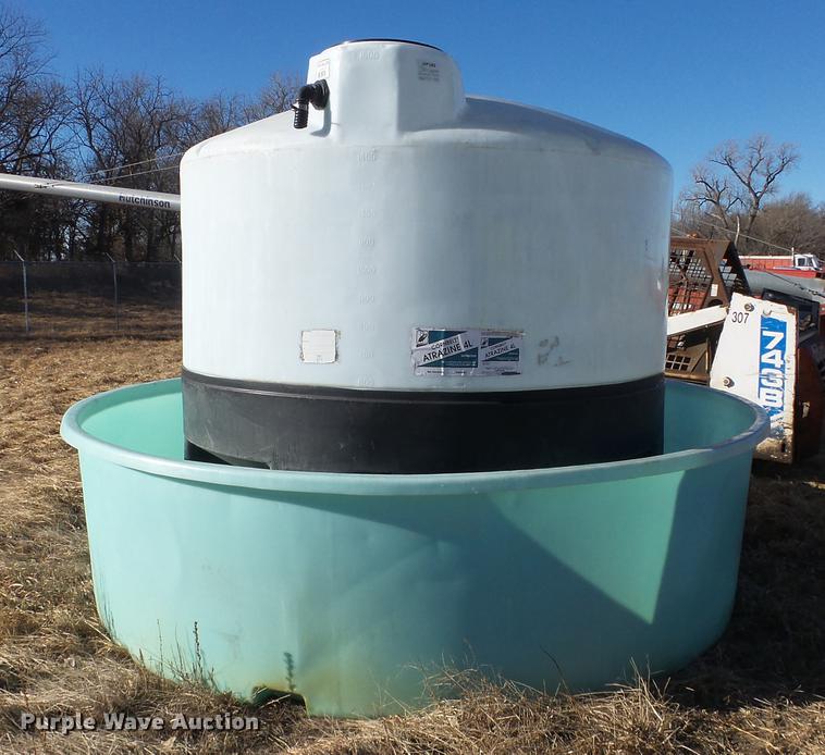 (2) poly tanks in Sterling, KS | Item DC0528 sold | Purple Wave