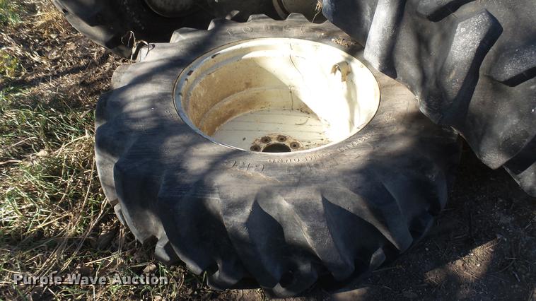 image for item DX9908 (4) Firestone Forestry Special 16.9-30 tires and wheels