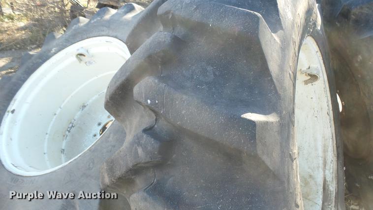 image for item DX9908 (4) Firestone Forestry Special 16.9-30 tires and wheels