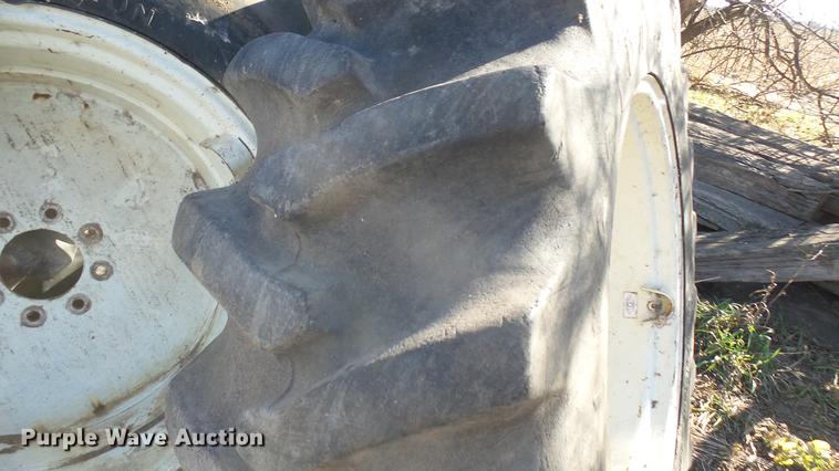 image for item DX9908 (4) Firestone Forestry Special 16.9-30 tires and wheels