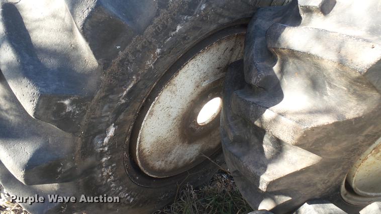 image for item DX9908 (4) Firestone Forestry Special 16.9-30 tires and wheels