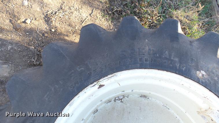 image for item DX9908 (4) Firestone Forestry Special 16.9-30 tires and wheels