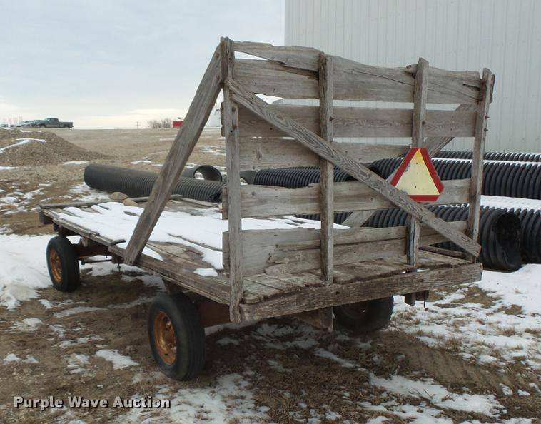 image for item EA9662 (2) grain wagons and hay trailer