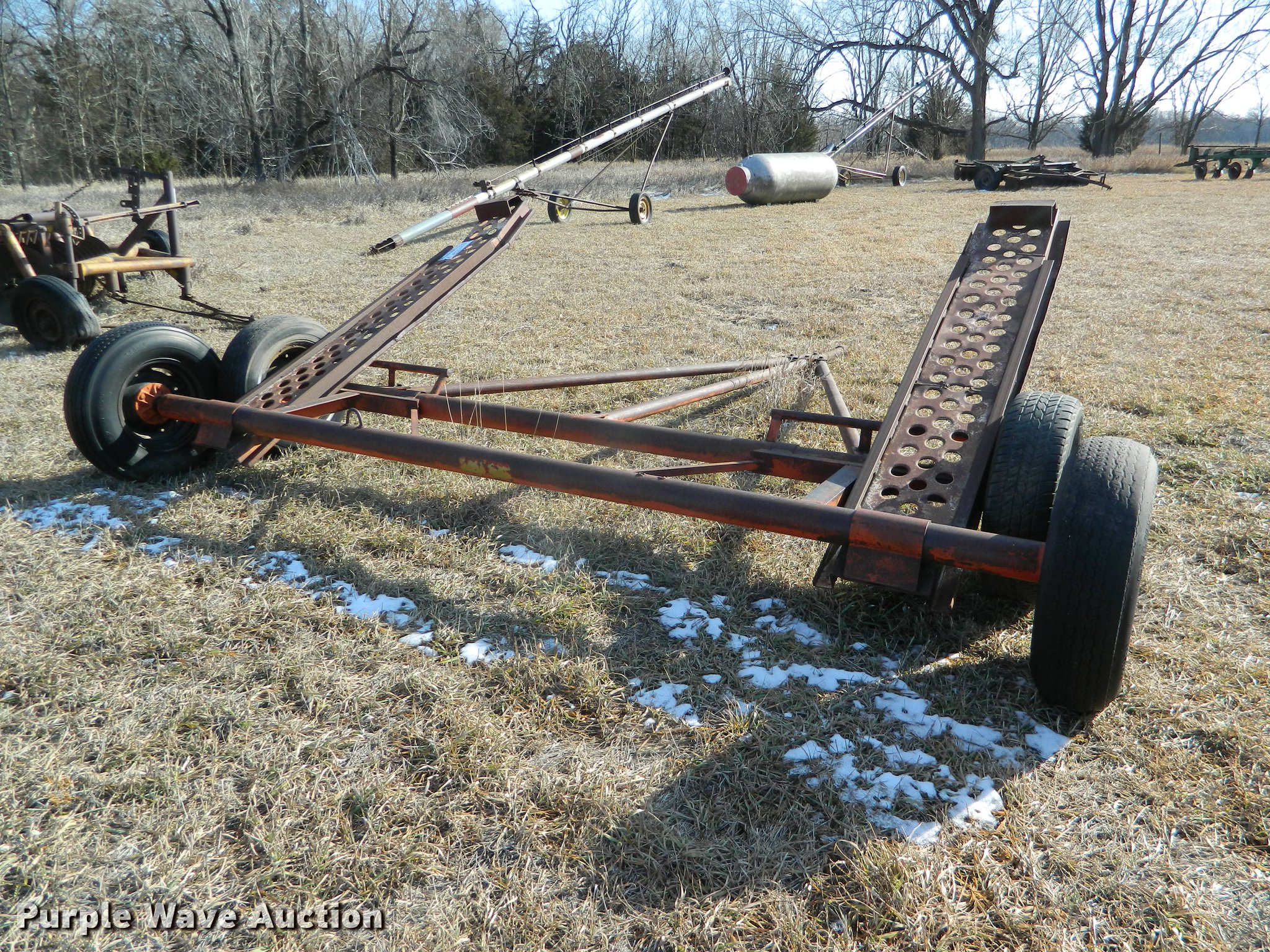 Swather trailer in Salina, KS Item DB6692 sold Purple Wave