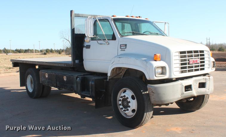 image for item DB5075 1999 GMC 7500 flat dump bed truck