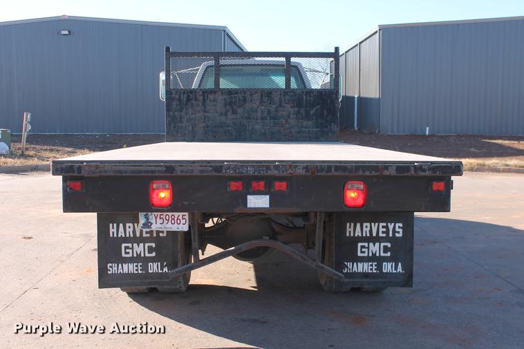 image for item DB5075 1999 GMC 7500 flat dump bed truck