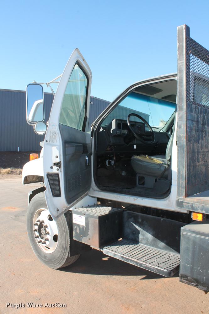 image for item DB5075 1999 GMC 7500 flat dump bed truck