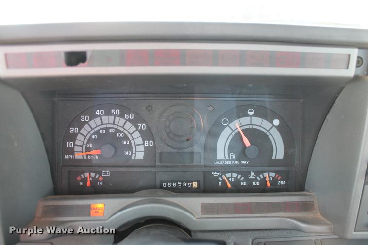 image for item DB5075 1999 GMC 7500 flat dump bed truck