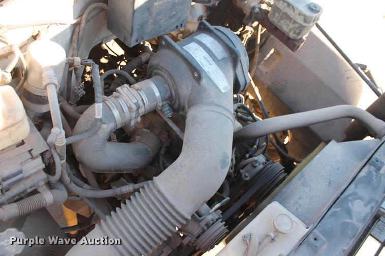 image for item DB5075 1999 GMC 7500 flat dump bed truck